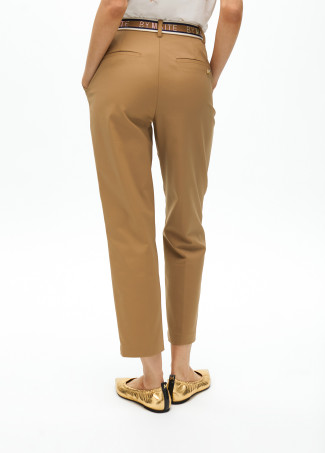 Stretchy chinos with rhinestone logos
