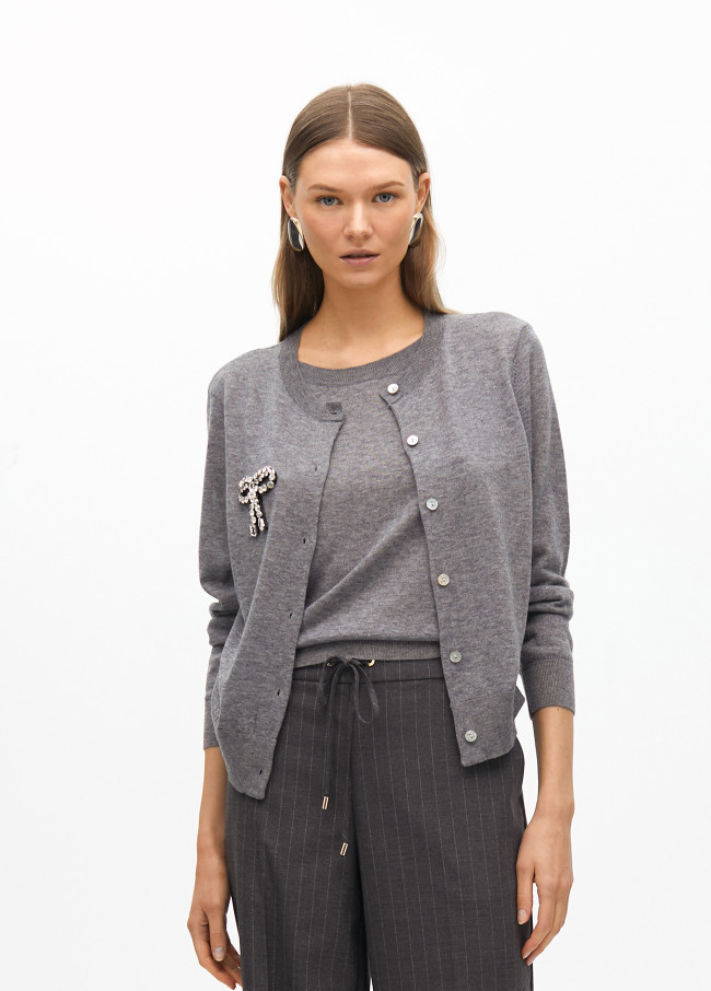 Two-piece cardigan with rhinestone bow