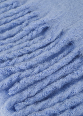 Bufanda lisa con flecos gruesos