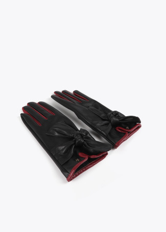 Faux leather gloves with bow