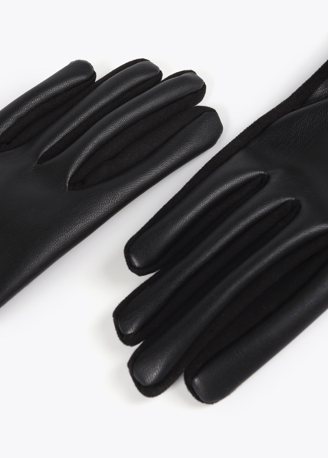 Faux leather gloves with wrist strap with oval...
