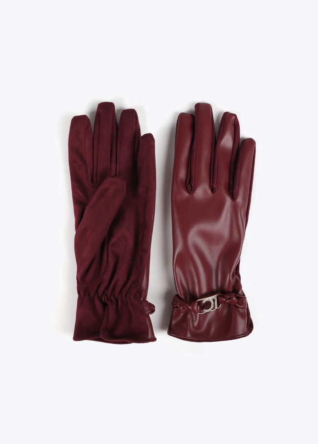Faux leather gloves with wrist strap with oval...