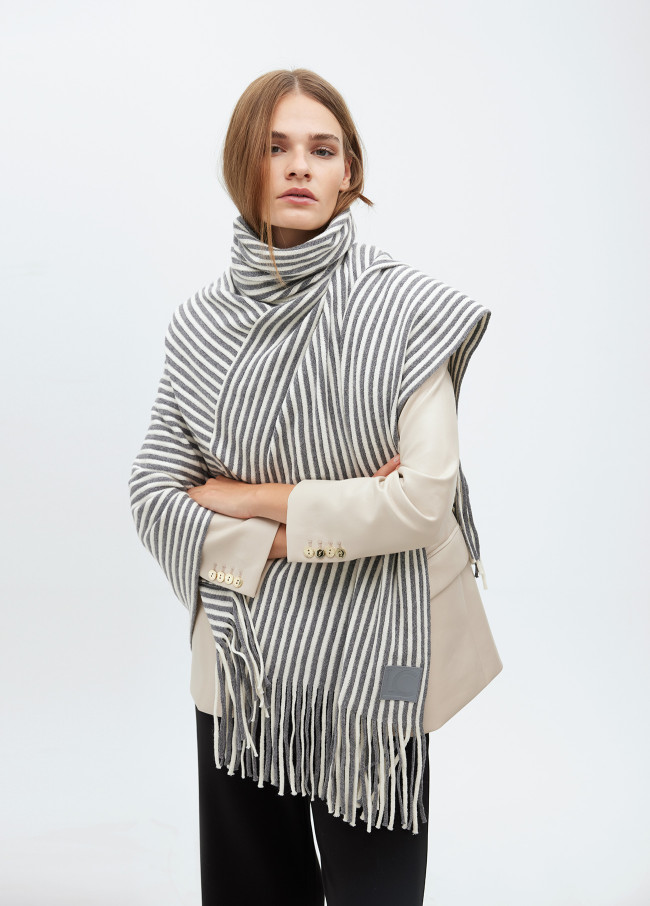 Poncho with striped knit collar