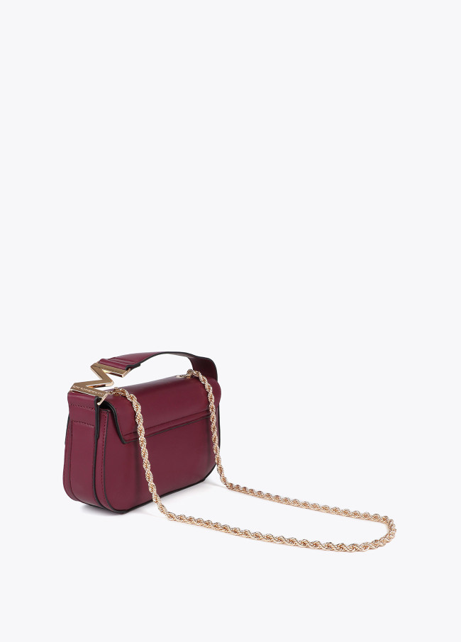 Crossbody bag with faux leather flap and M logo...