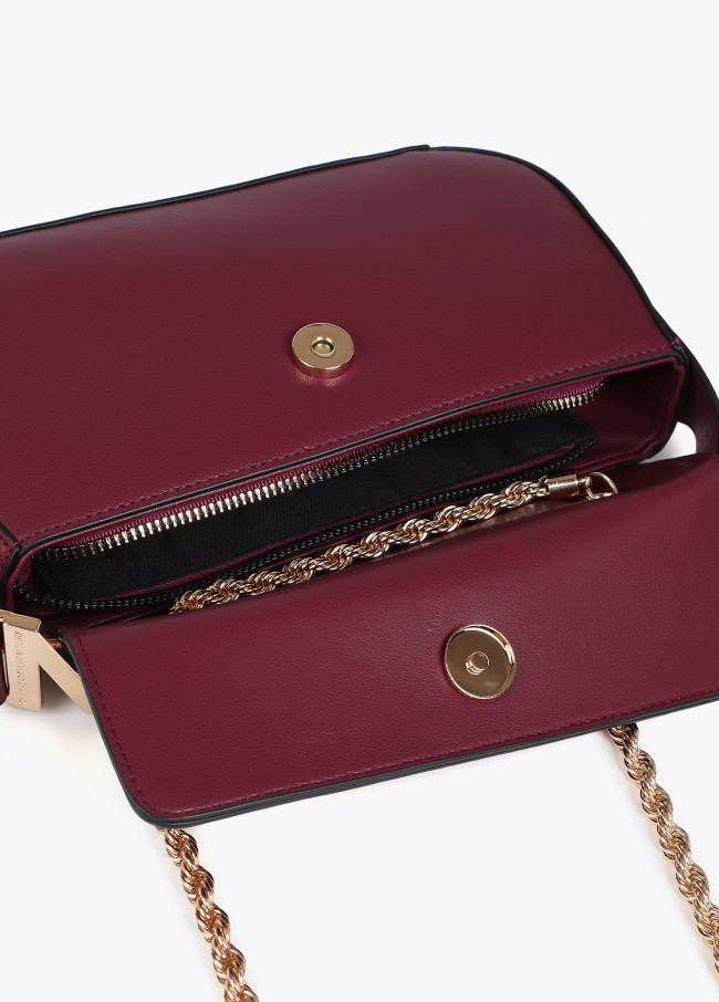 Crossbody bag with faux leather flap and M logo...