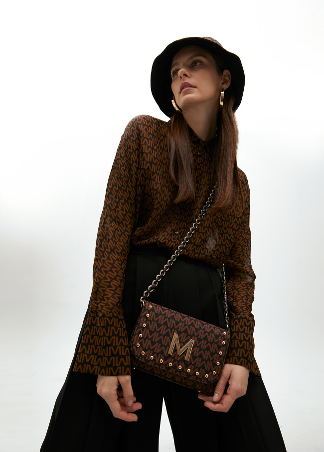 Crossbody bag with jacquard monogram flap