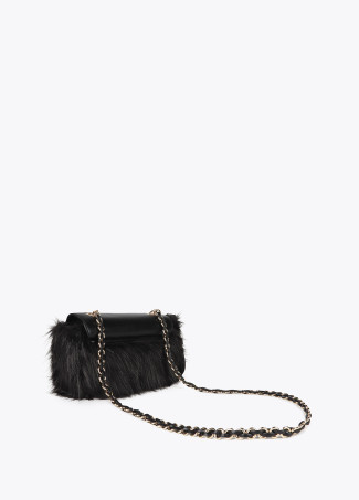 Faux fur crossbody bag with faux leather flap