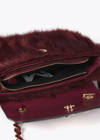 Faux fur crossbody bag with faux leather flap