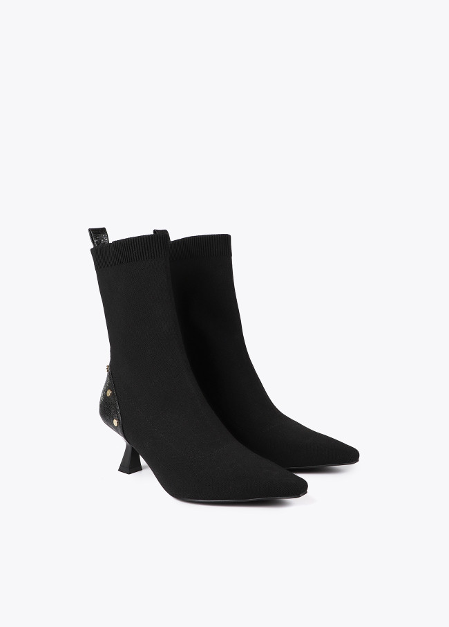 Sock-style ankle boots with snakeskin print...