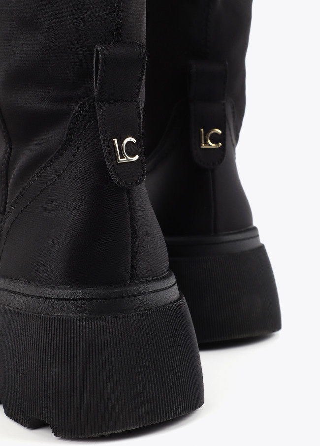 Knee-high sock-style boots