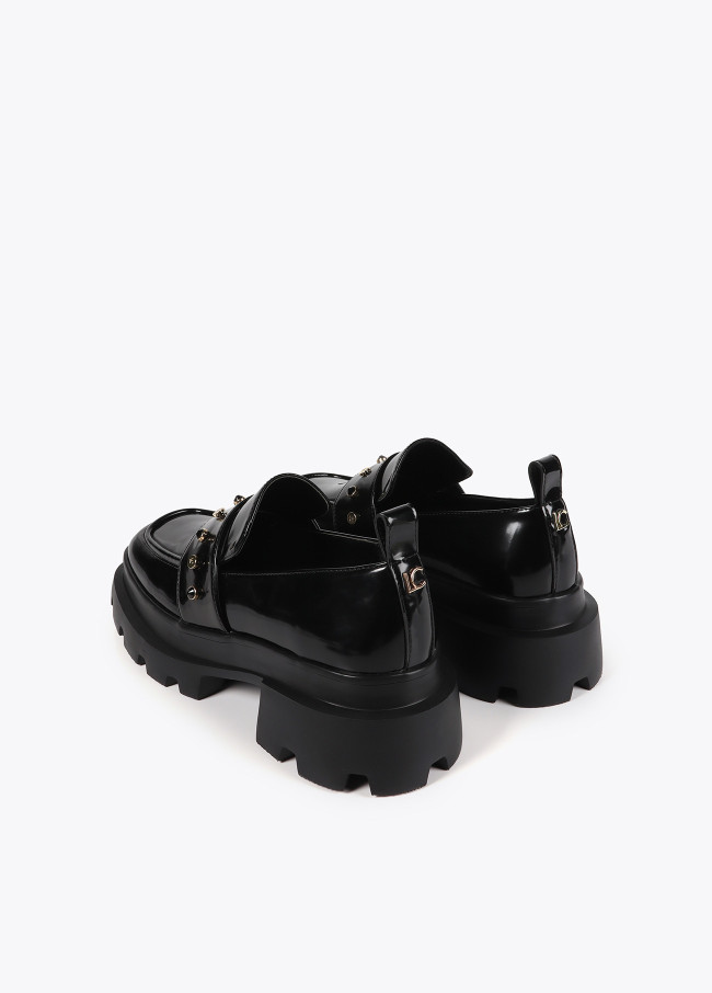 Loafers with square toe rivet details