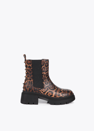 Animal print ankle boots with track sole and strap with metal details