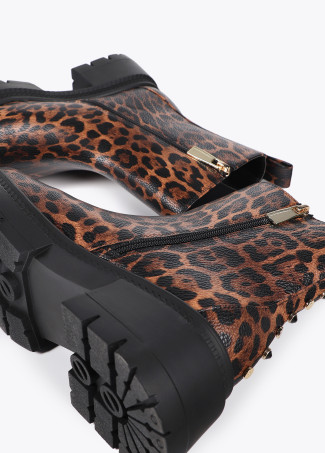 Animal print ankle boots with track sole and strap with metal details