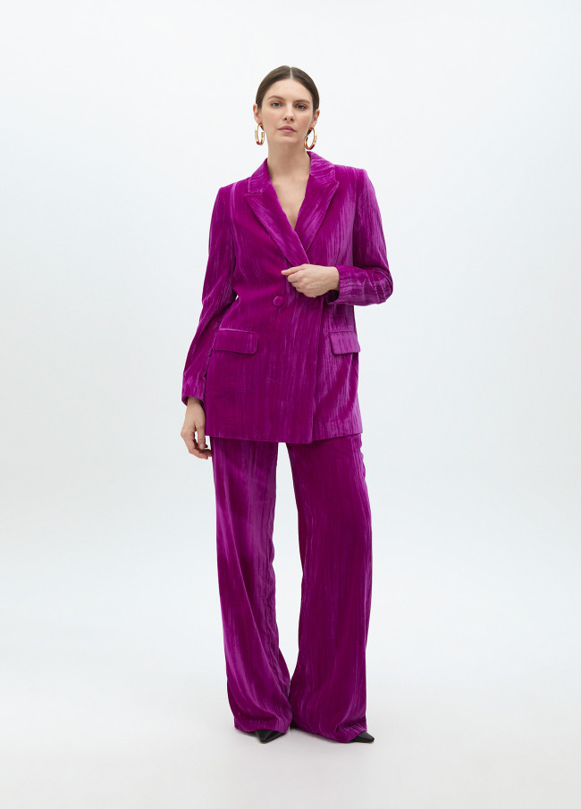 Velvet blazer with flower on lapel