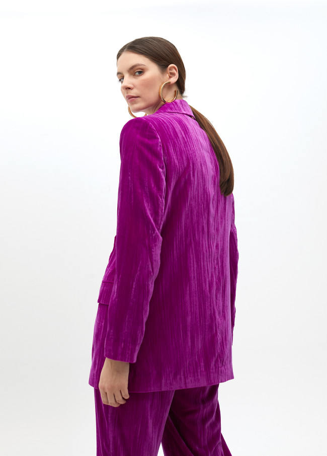 Velvet blazer with flower on lapel