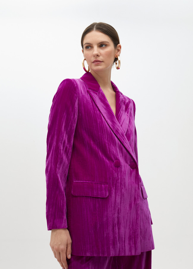 Velvet blazer with flower on lapel