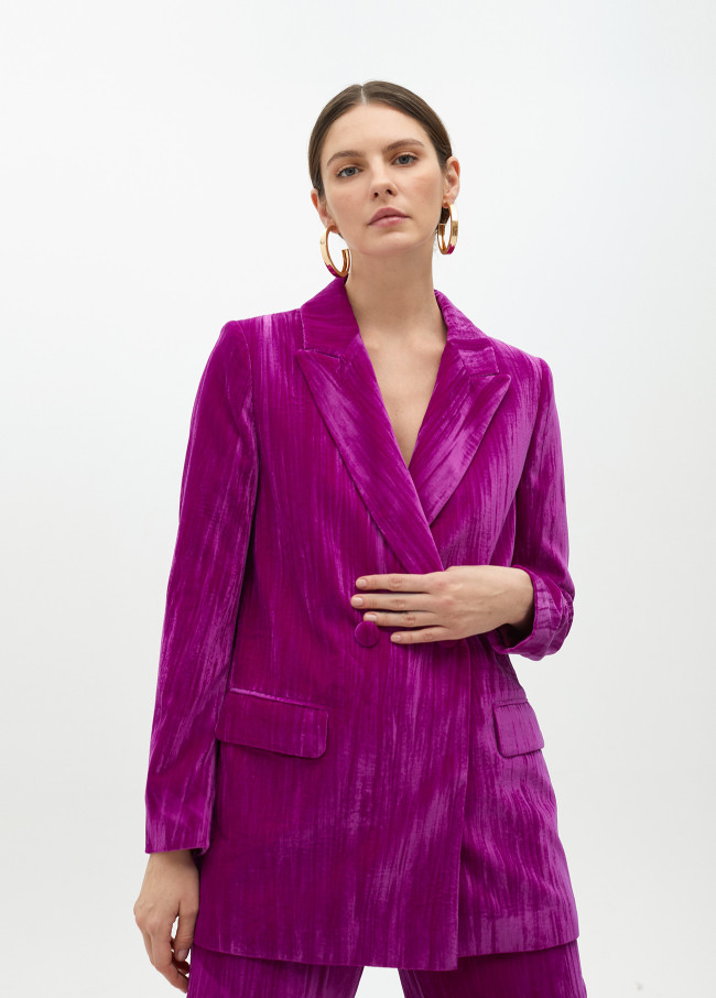 Velvet blazer with flower on lapel