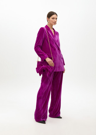 Velvet blazer with flower on lapel