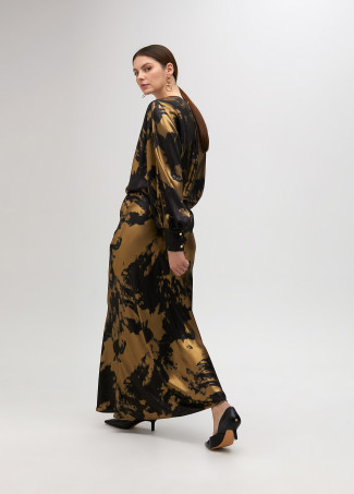 Long printed dress with asymmetrical sleeves