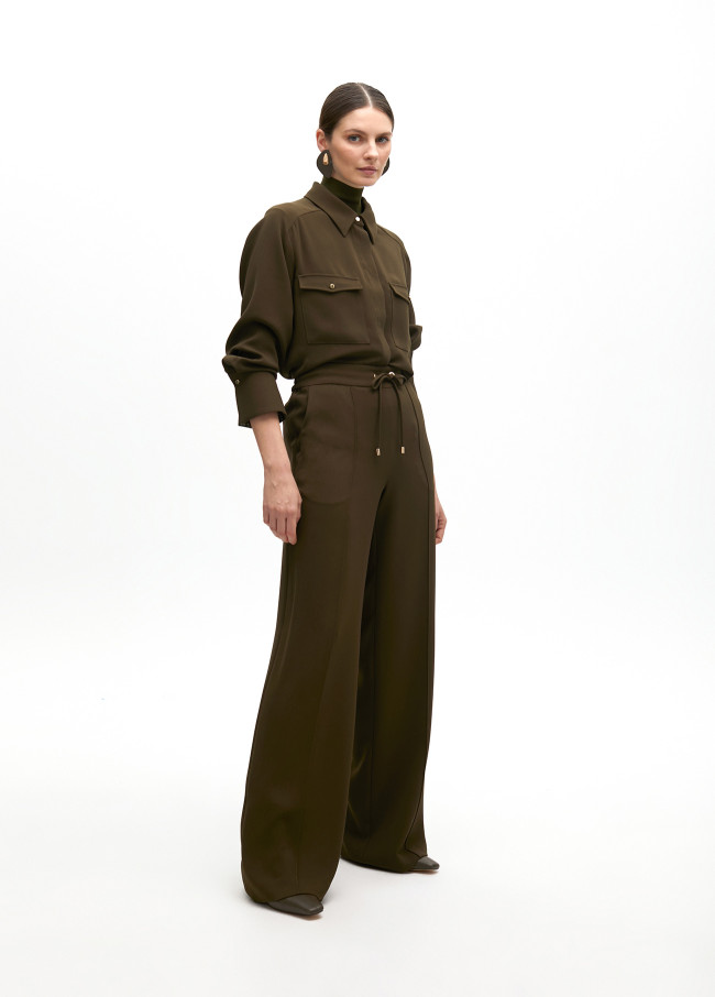 Straight trousers with elastic and central rib