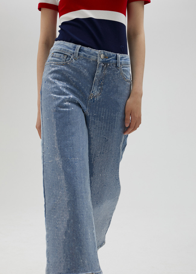 Jeans cropped con paillette