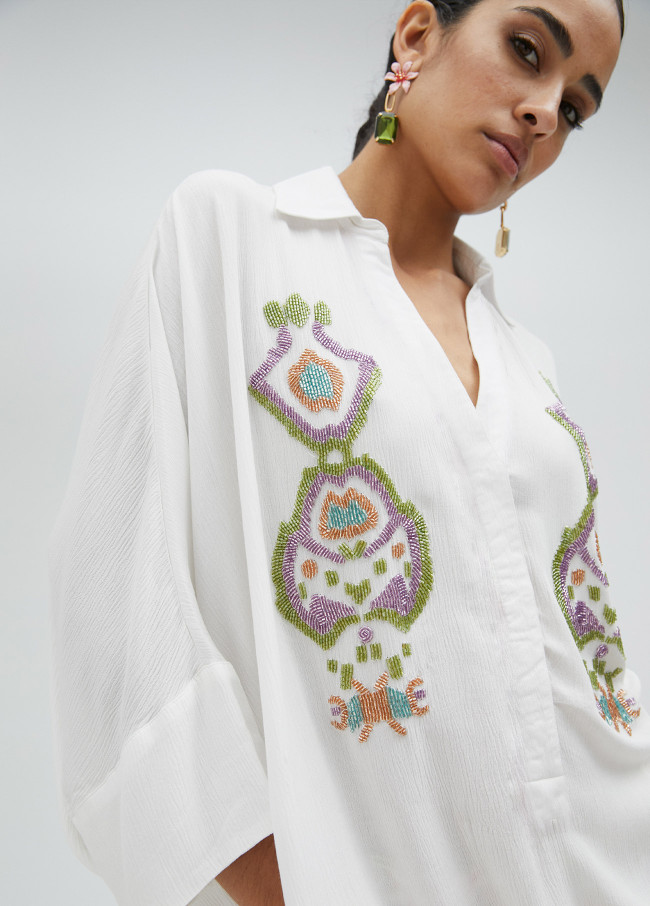 Camisa corta con manga embroidery
