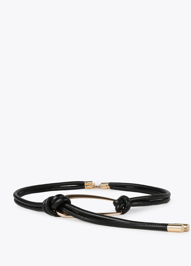 Ceinture cordon avec pièce métallique