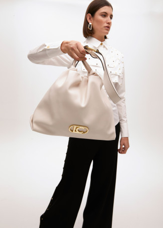 Faux leather tote bag with oval LC logo.