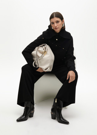 Faux leather tote bag with oval LC logo.