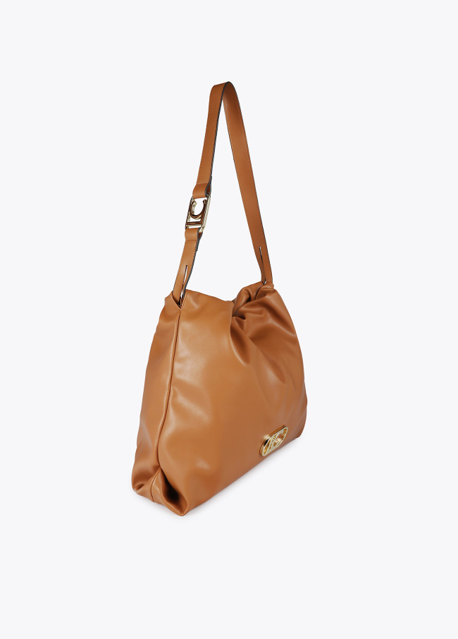 Faux leather tote bag with oval LC logo.