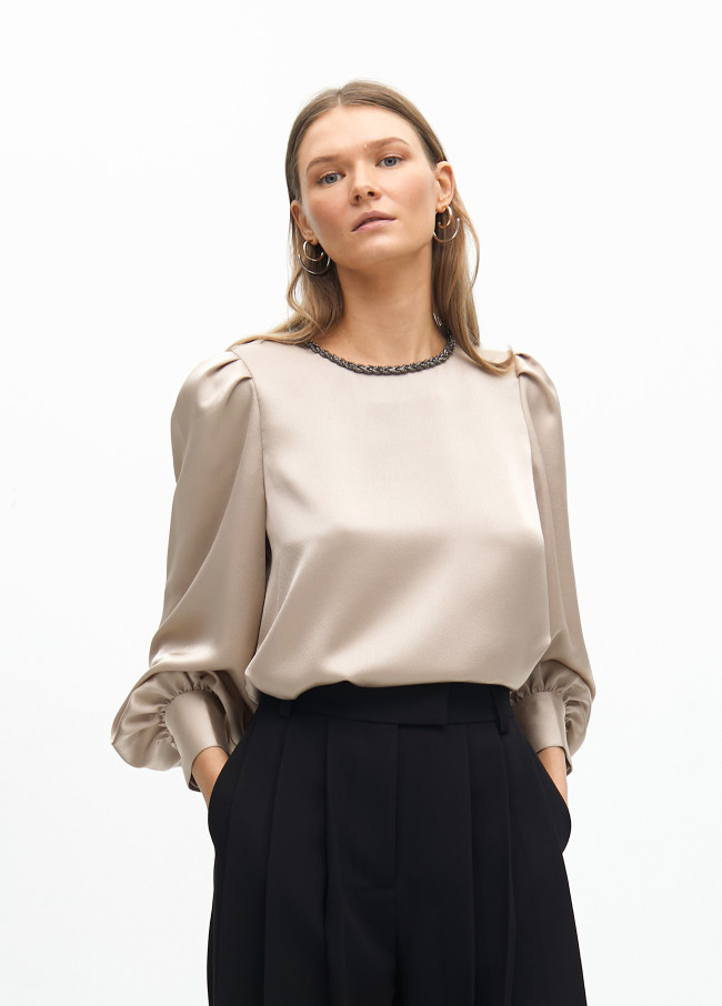 Blouse with jewel detail on the neck