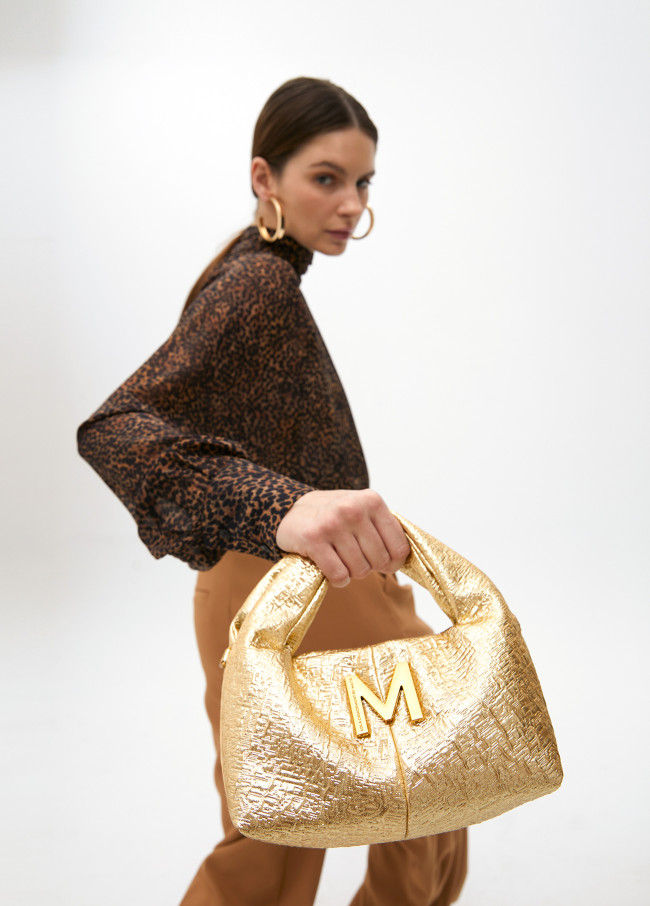 Golden fabric event bag