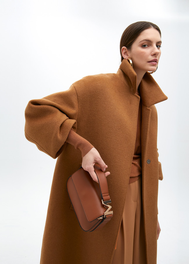 Crossbody bag with faux leather flap and M logo...