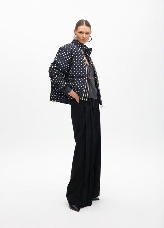 Short quilted anorak with polka dots