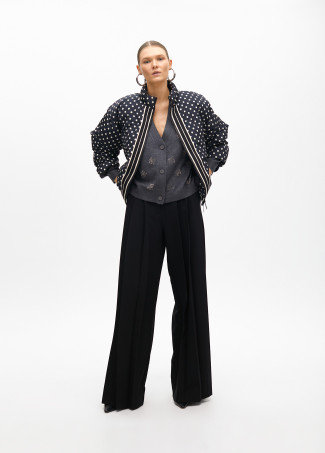 Short quilted anorak with polka dots