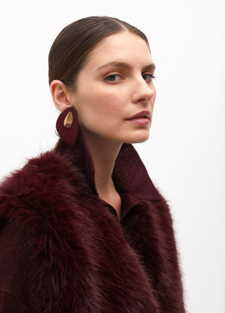 Gilet with fuzzy lining and logos