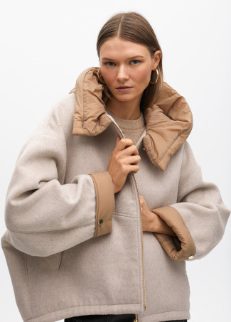 Short hooded coat in two materials: nylon and cloth