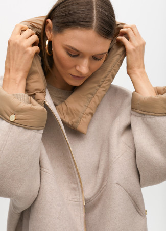 Short hooded coat in two materials: nylon and cloth