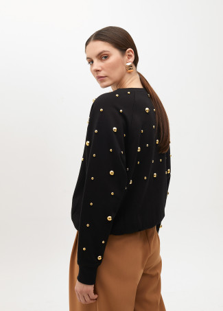 Sudadera con tachas redondas