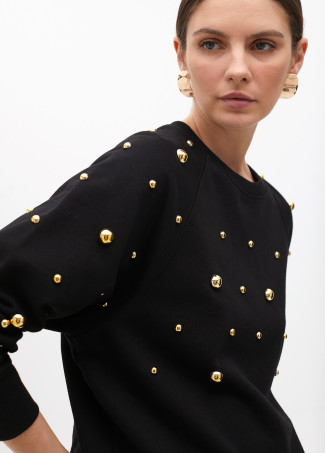 Sudadera con tachas redondas