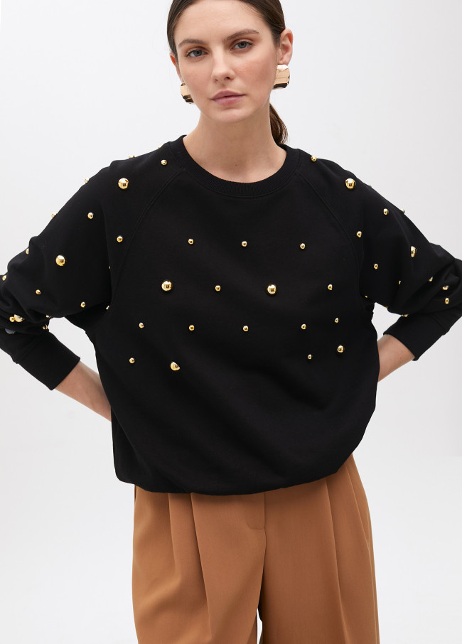 Sudadera con tachas redondas