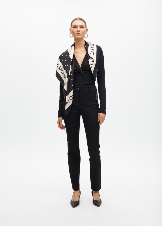 Stretch fabric trousers with zipped pocket