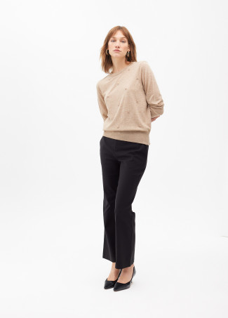 Cropped flared trousers with rhinestone detail at the waist