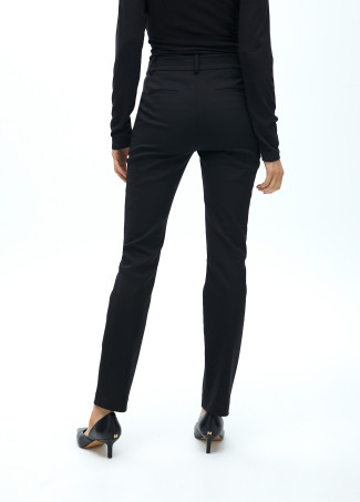 Stretch fabric trousers with zipped pocket