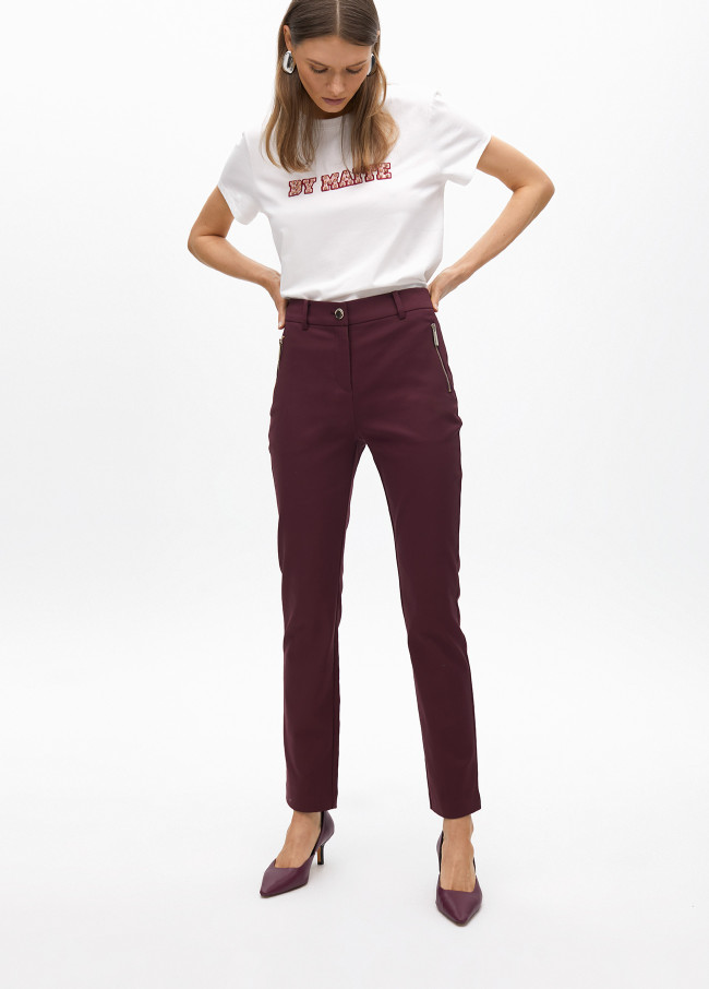 Pantalón bolsillo con cremallera tejido elástico