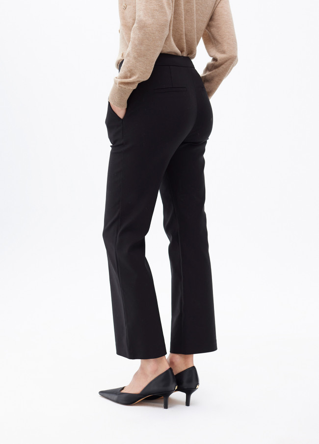 Cropped flared trousers with rhinestone detail...