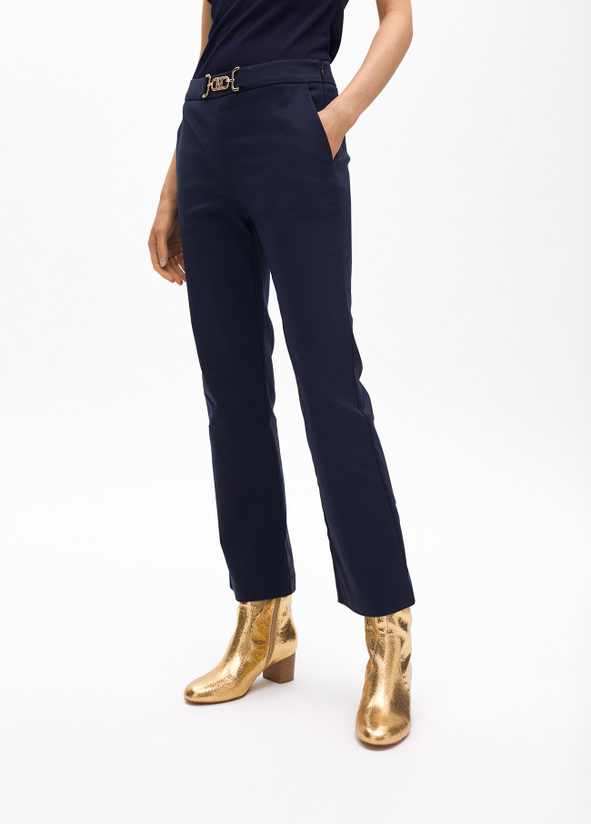 Cropped flared trousers with rhinestone detail...