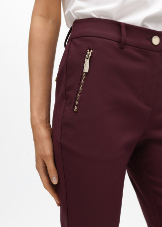 Pantalón bolsillo con cremallera tejido elástico