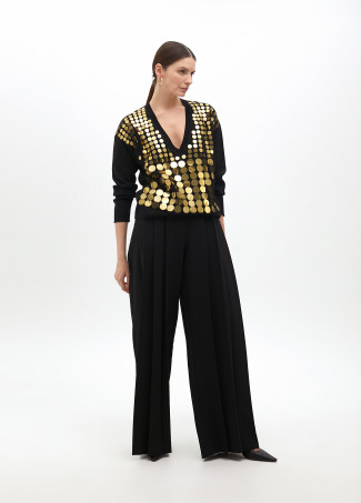 Sequinned mesh sweater