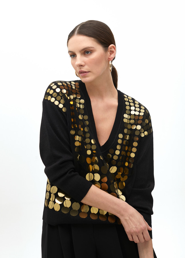 Sequinned mesh sweater